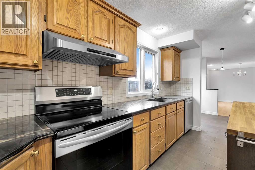 815 Woodpark Way Sw, Calgary, Alberta  T2W 2T9 - Photo 22 - A2288229