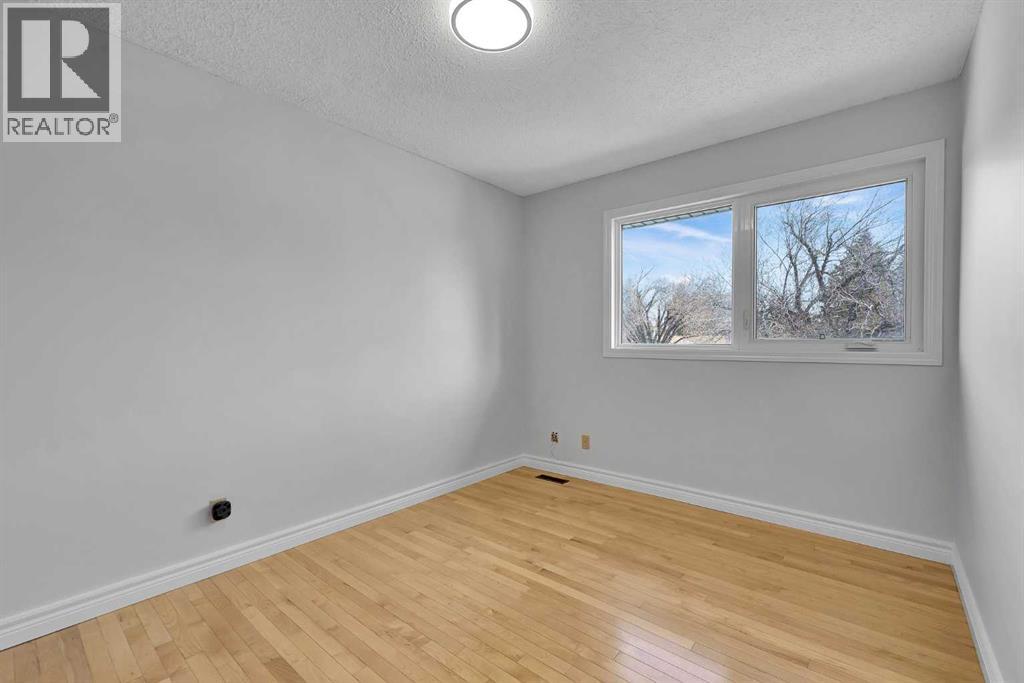 815 Woodpark Way Sw, Calgary, Alberta  T2W 2T9 - Photo 31 - A2288229