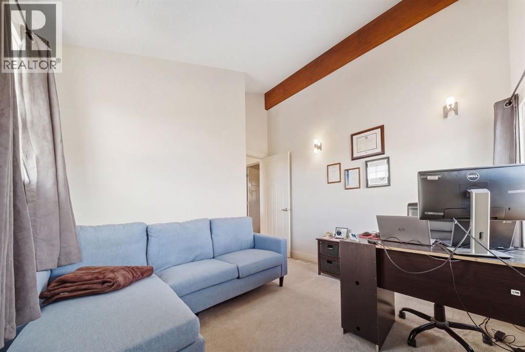 212 Cottageclub Crescent, Rural Rocky View County, Alberta  T2K 1B3 - Photo 19 - A2291790