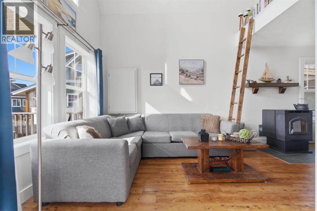 212 Cottageclub Crescent, Rural Rocky View County, Alberta  T2K 1B3 - Photo 2 - A2291790