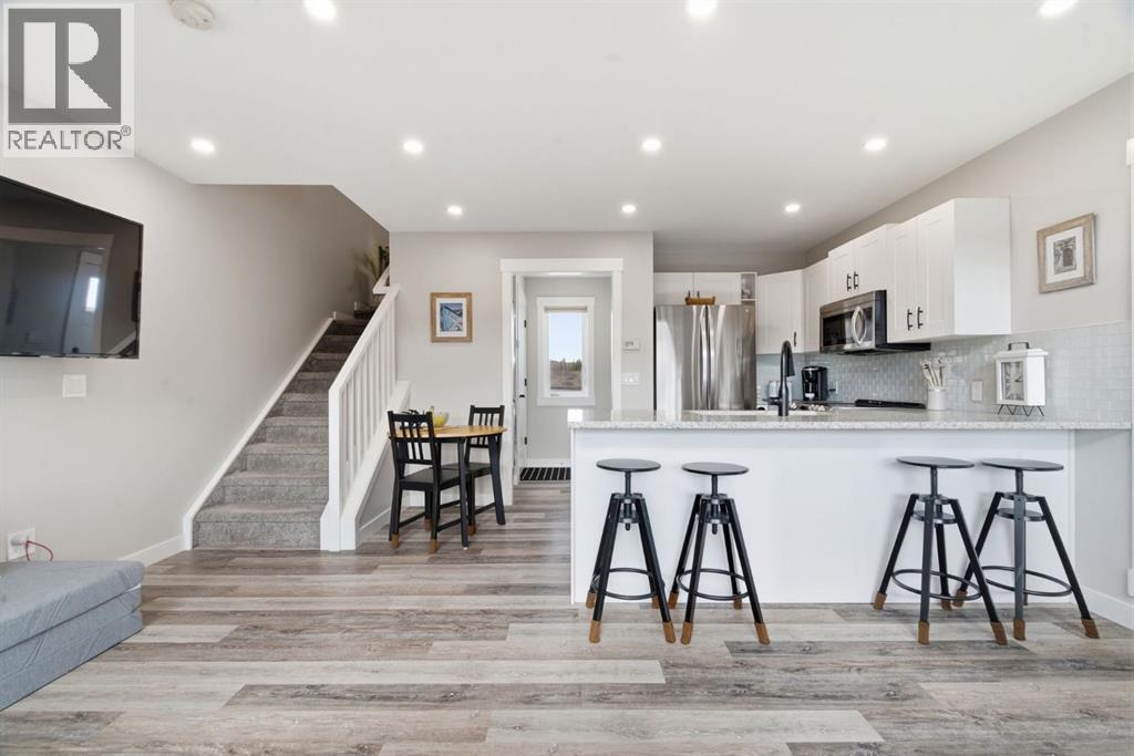 212 Cottageclub Crescent, Rural Rocky View County, Alberta  T2K 1B3 - Photo 27 - A2291790