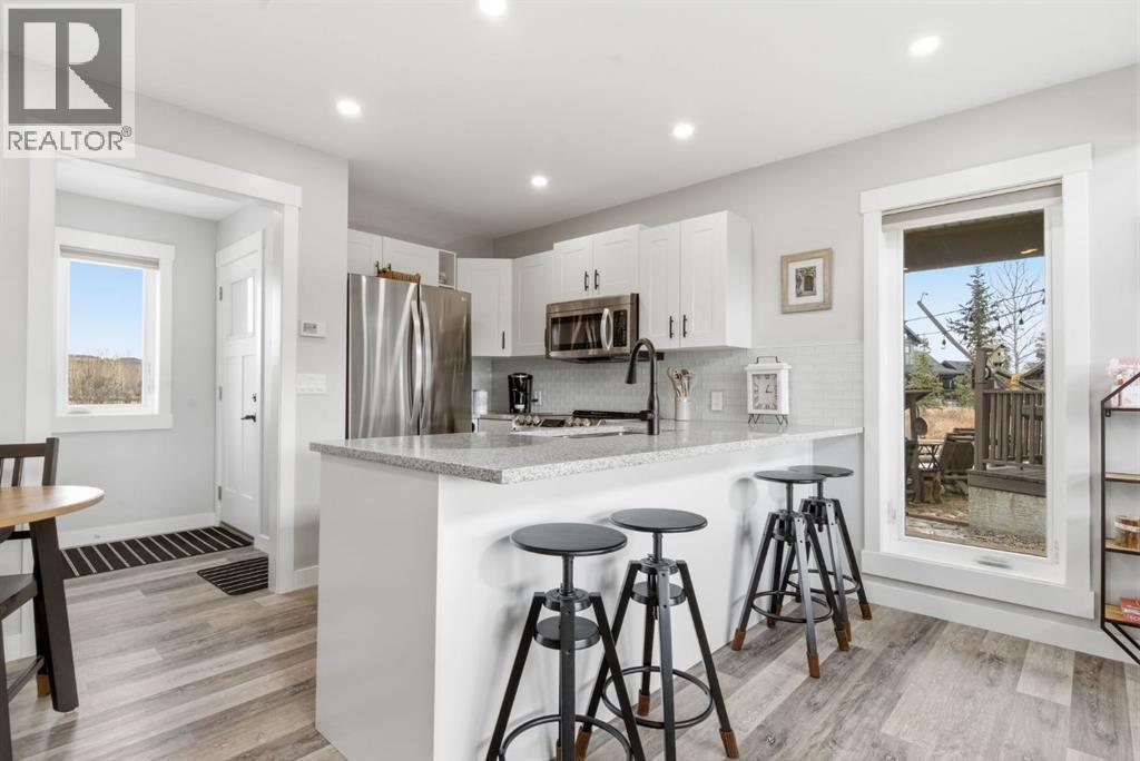 212 Cottageclub Crescent, Rural Rocky View County, Alberta  T2K 1B3 - Photo 28 - A2291790