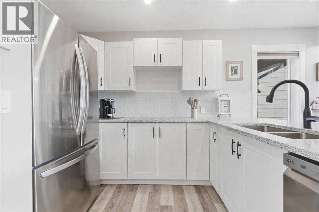 212 Cottageclub Crescent, Rural Rocky View County, Alberta  T2K 1B3 - Photo 29 - A2291790