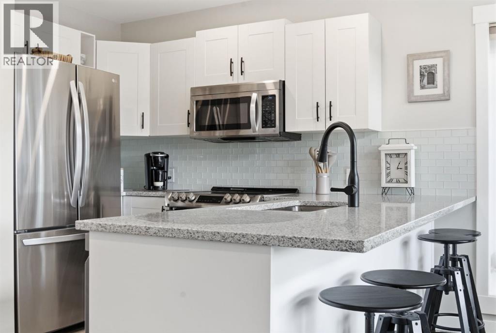 212 Cottageclub Crescent, Rural Rocky View County, Alberta  T2K 1B3 - Photo 30 - A2291790