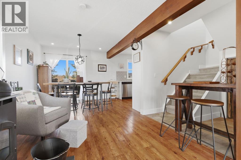 212 Cottageclub Crescent, Rural Rocky View County, Alberta  T2K 1B3 - Photo 9 - A2291790