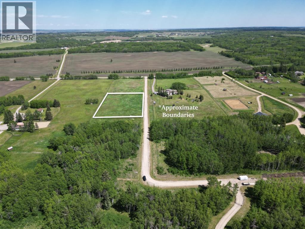 12 Elkstone Way, Rural Rocky View County, Alberta  T4C 2Y8 - Photo 1 - A2276103