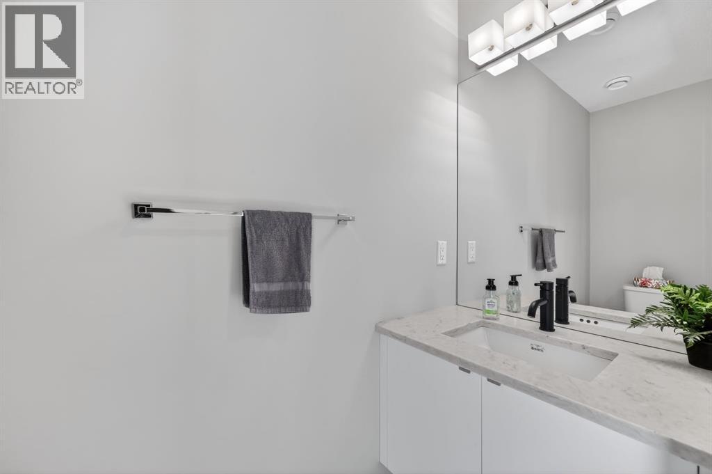 403 Bow Grove Nw, Calgary, Alberta  T3B 6E8 - Photo 6 - A2291656