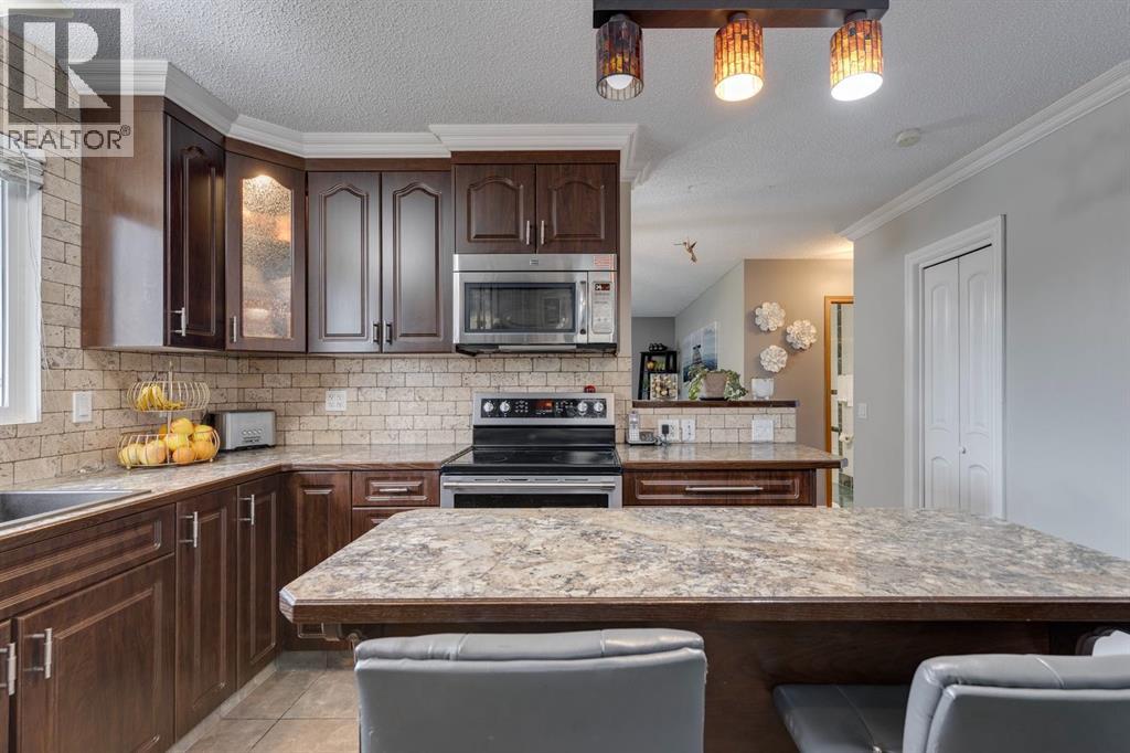 299 Doverview Crescent Se, Calgary, Alberta  T2B 1Y7 - Photo 11 - A2290476