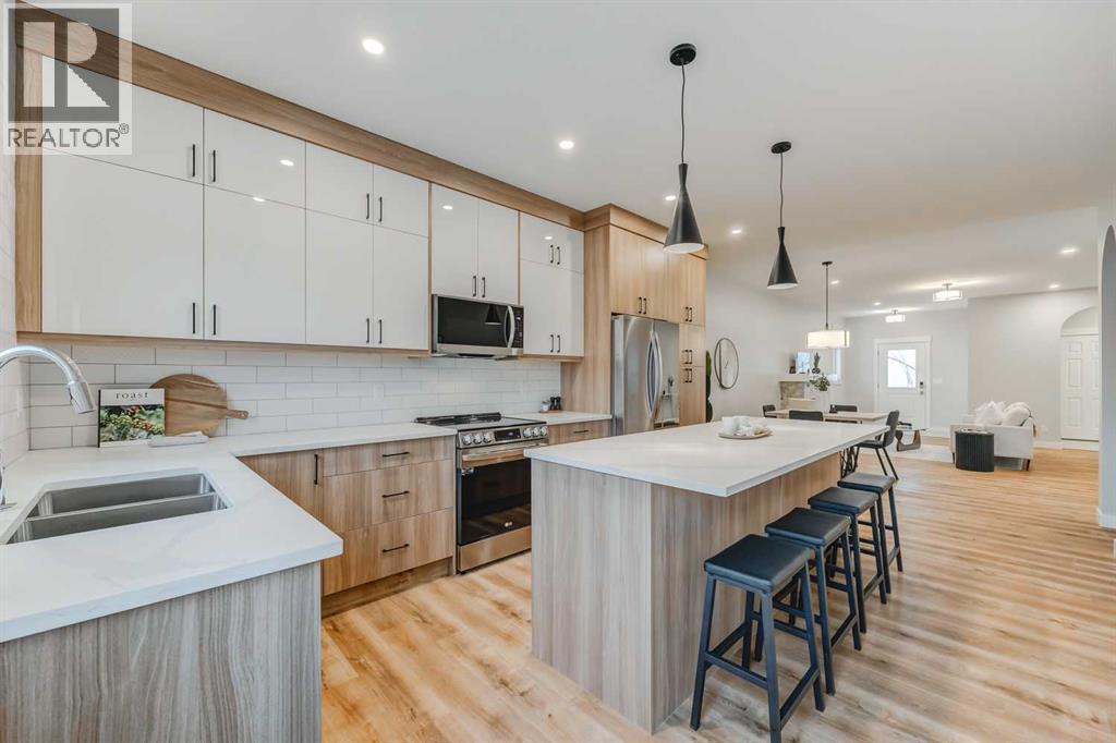 7 Clover Crescent, Beiseker, Alberta  T0M 0G0 - Photo 6 - A2290188