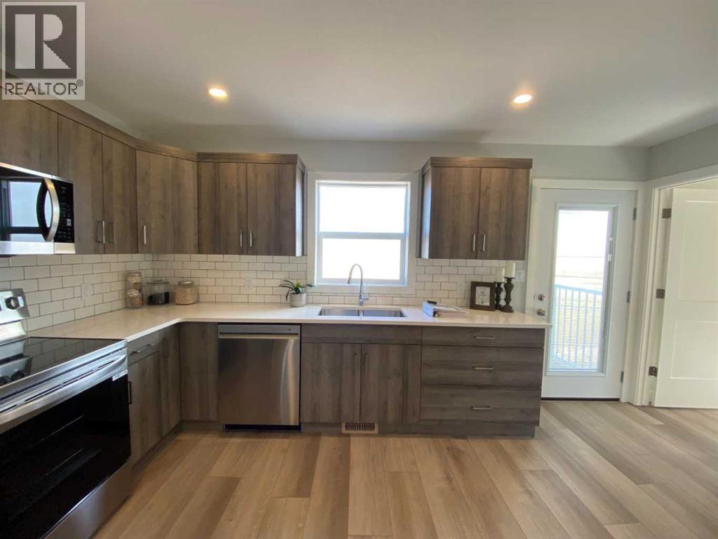 4229 57 Street, Taber, Alberta  T1G 0G8 - Photo 11 - A2288203