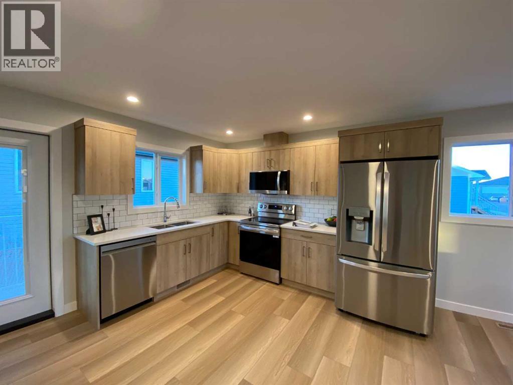 4202 57 Street, Taber, Alberta  T1G 0G8 - Photo 11 - A2291358