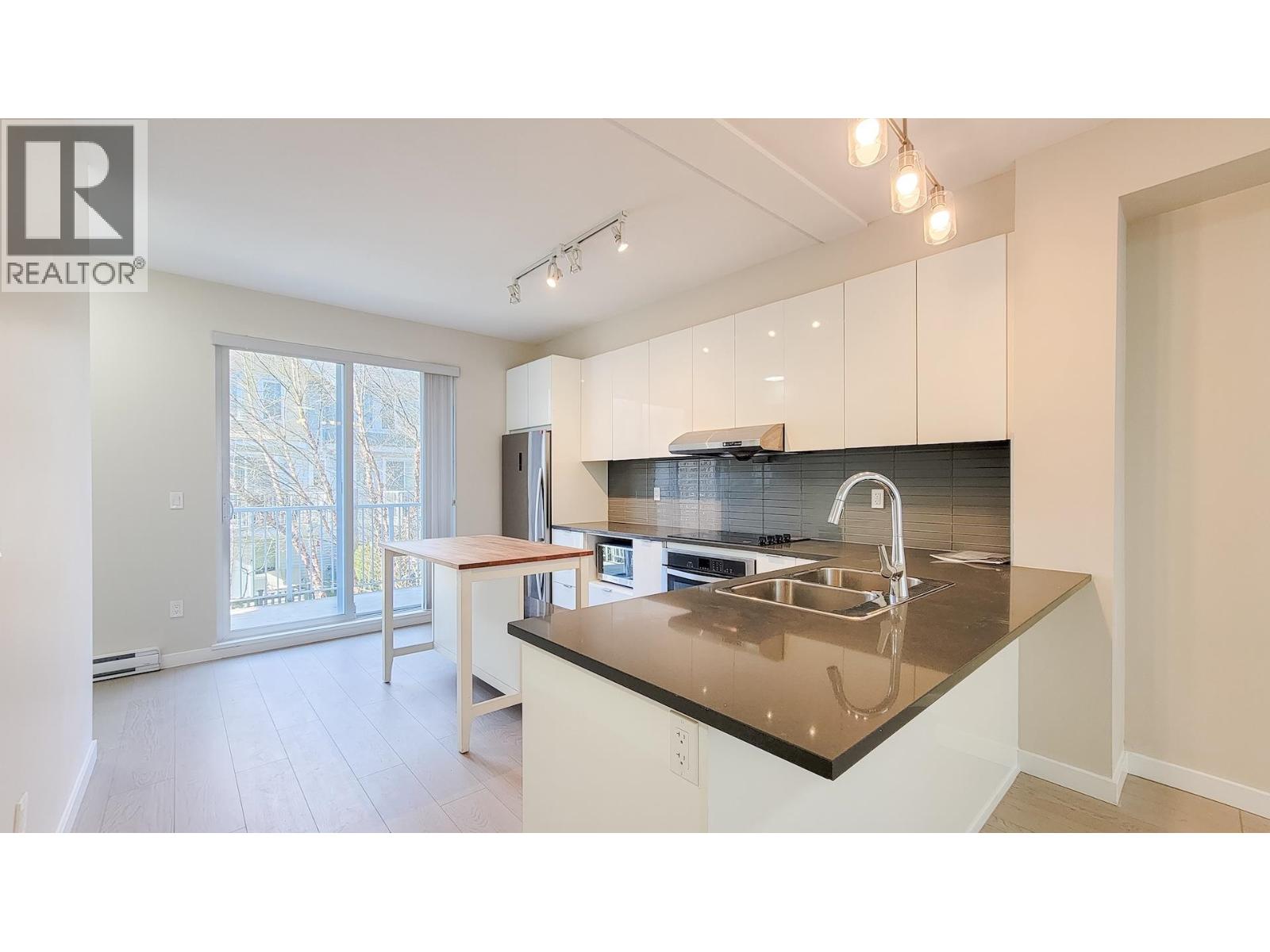 100 5550 Admiral Way, Delta, British Columbia  V4K 0C4 - Photo 2 - R3097682