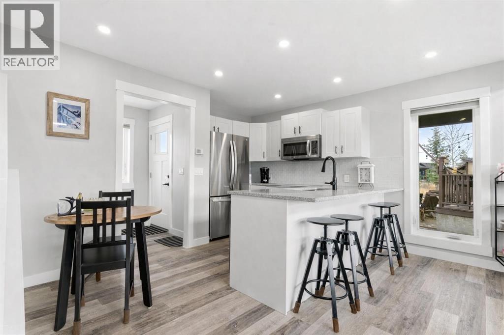 212 Cottageclub Crescent, Rural Rocky View County, Alberta  T2K 1B3 - Photo 27 - A2291790