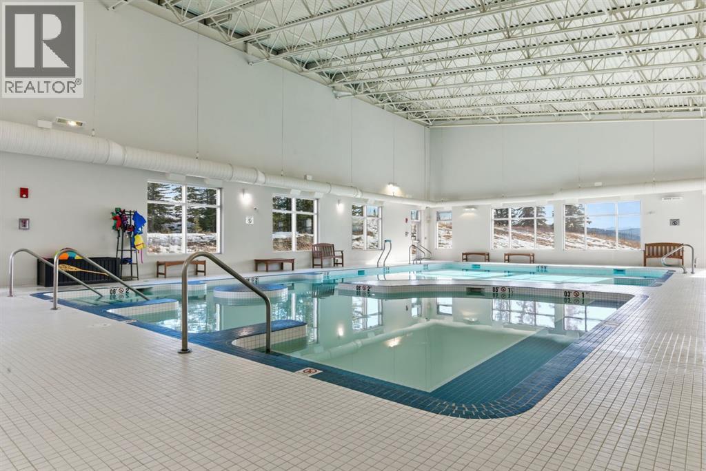 212 Cottageclub Crescent, Rural Rocky View County, Alberta  T2K 1B3 - Photo 40 - A2291790