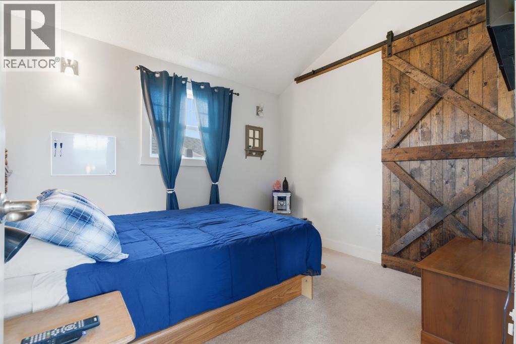 212 Cottageclub Crescent, Rural Rocky View County, Alberta  T2K 1B3 - Photo 16 - A2291790