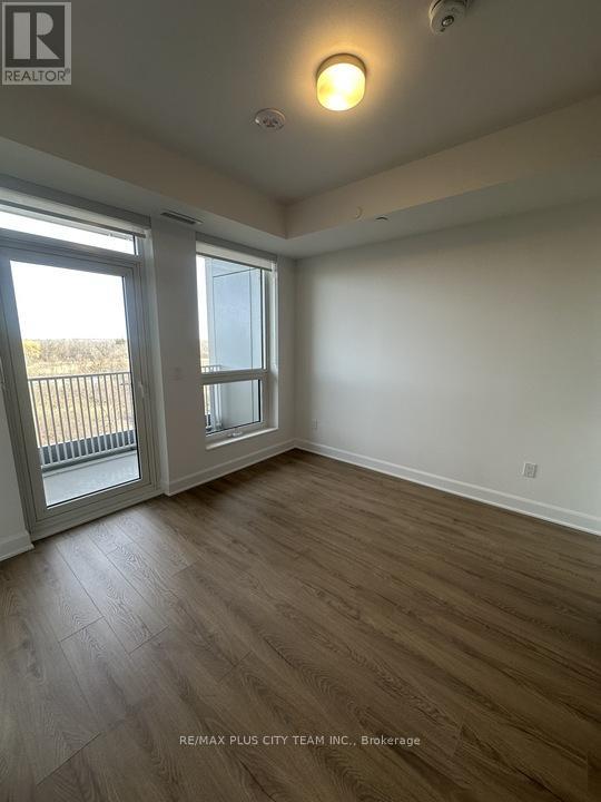 721 - 3240 William Coltson Avenue, Oakville, Ontario  L6H 8C8 - Photo 3 - W12864026