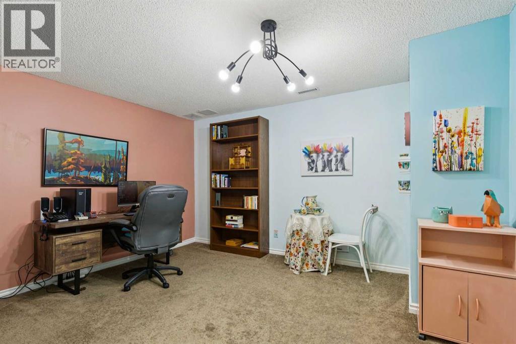 48 Deer Ridge Close Se, Calgary, Alberta  T2J 7C2 - Photo 24 - A2290007