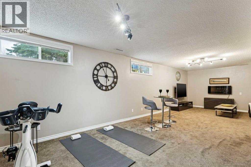 48 Deer Ridge Close Se, Calgary, Alberta  T2J 7C2 - Photo 20 - A2290007