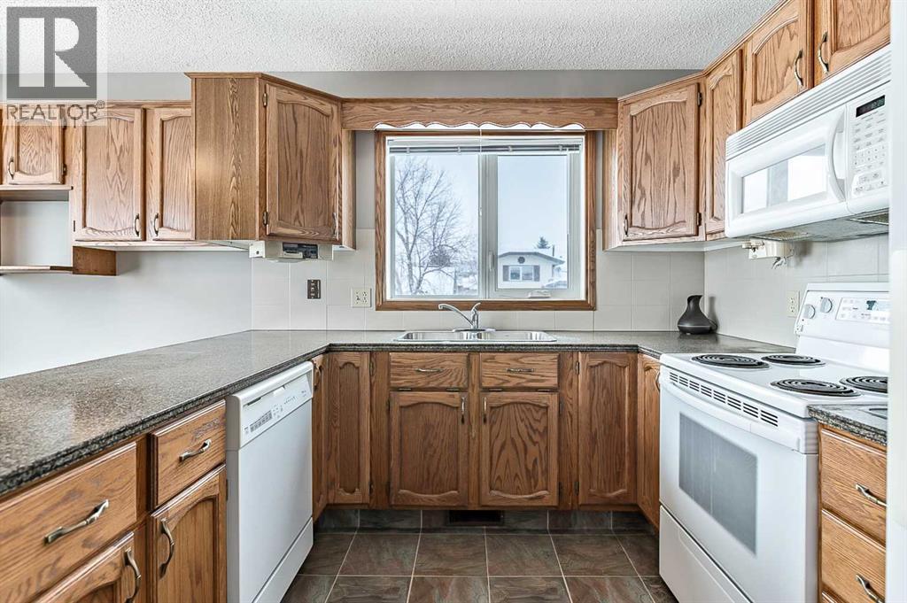 104 Macewan Meadow Way Nw, Calgary, Alberta  T3K 3H8 - Photo 11 - A2273932