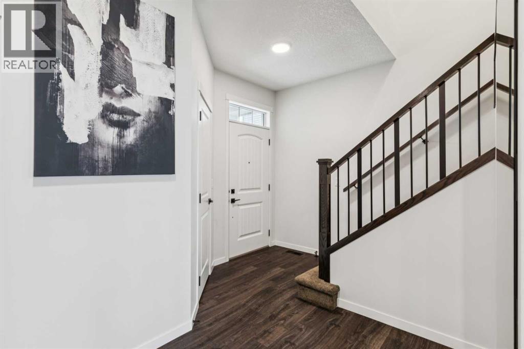 86 Creekside Way Sw, Calgary, Alberta  T2X 4A9 - Photo 2 - A2278154