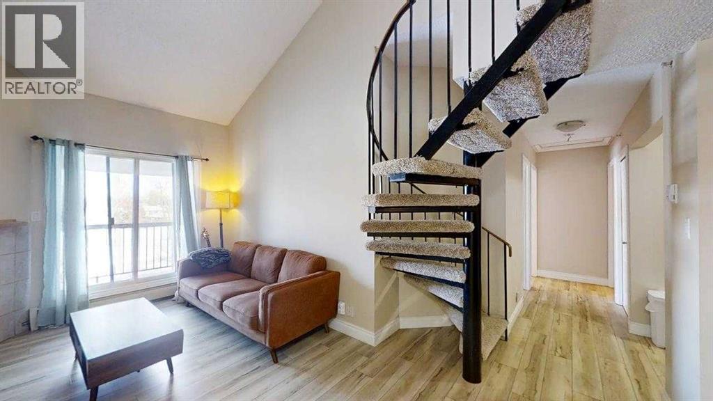 302, 4210 20 Avenue S, Lethbridge, Alberta  T1K 4X9 - Photo 1 - A2288074