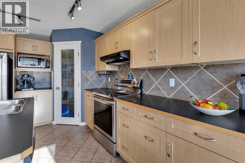 133 Rocky Ridge Heath Nw, Calgary, Alberta  T3G 4Z8 - Photo 14 - A2288834