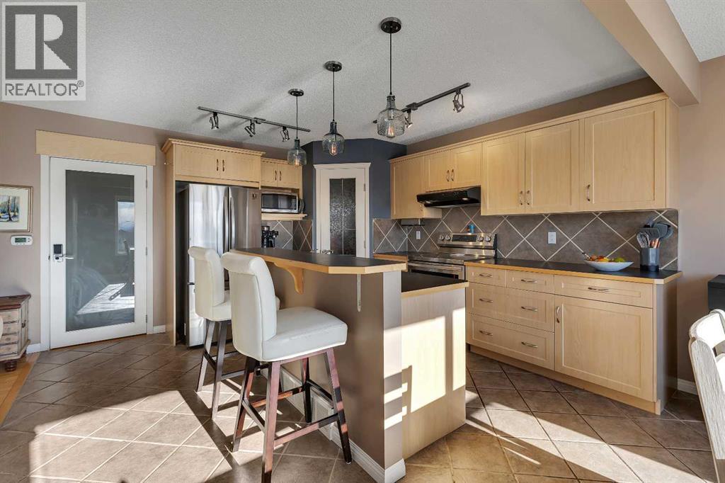 133 Rocky Ridge Heath Nw, Calgary, Alberta  T3G 4Z8 - Photo 11 - A2288834