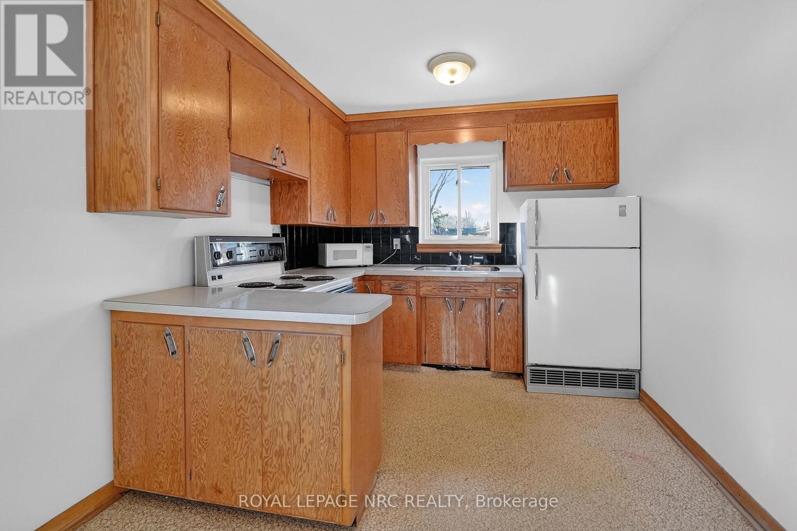 86 Royal Manor Drive, St. Catharines, Ontario  L2M 4L7 - Photo 7 - X12864724