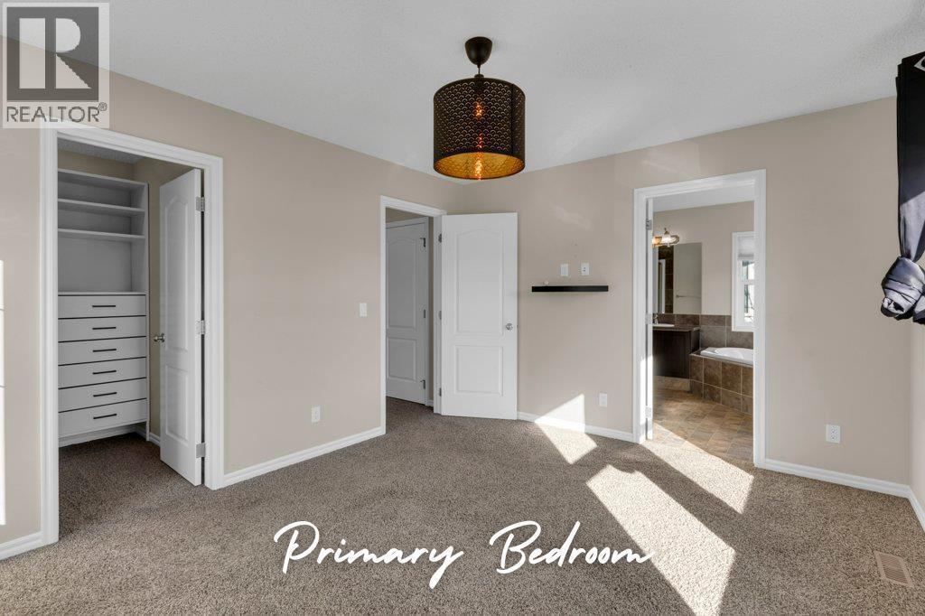 207 River Heights Crescent, Cochrane, Alberta  T4C 0V1 - Photo 20 - A2286899