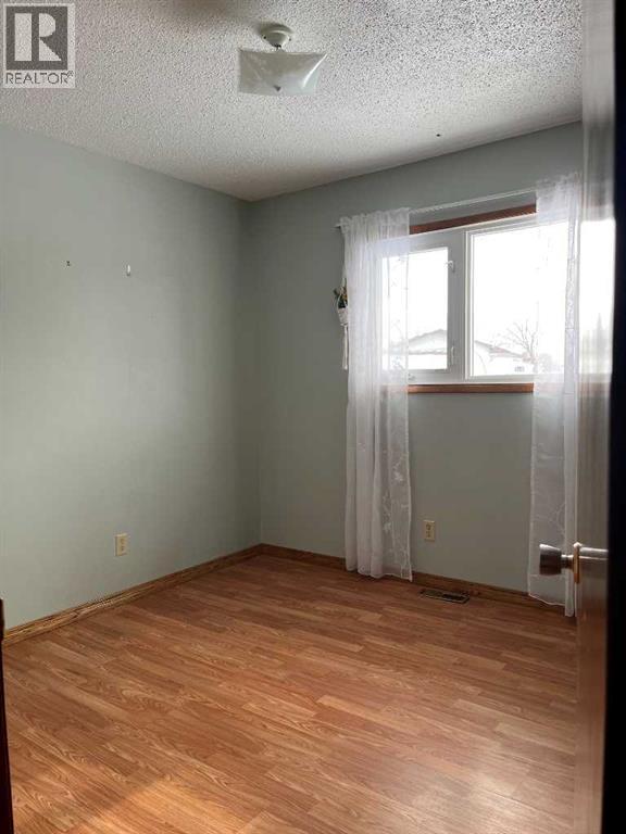 9105 100 Avenue, Sexsmith, Alberta  T0H 3C0 - Photo 11 - A2292081