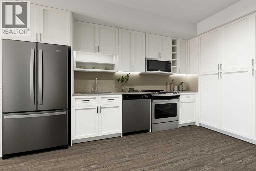 203, 3107 Warren Street Nw, Calgary, Alberta  T3B 6N7 - Photo 5 - A2285029