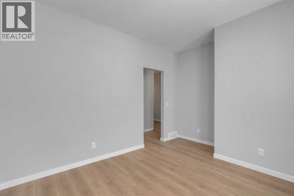 1277 Creekview Drive Sw, Calgary, Alberta  T2X 4Y1 - Photo 4 - A2271942