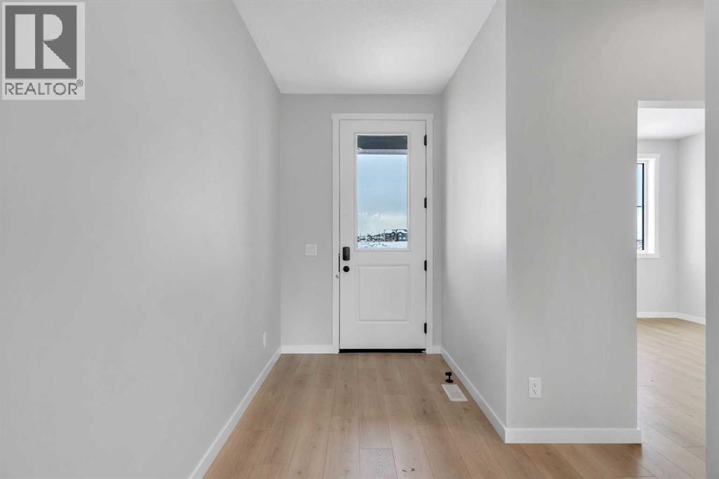 1277 Creekview Drive Sw, Calgary, Alberta  T2X 4Y1 - Photo 2 - A2271942