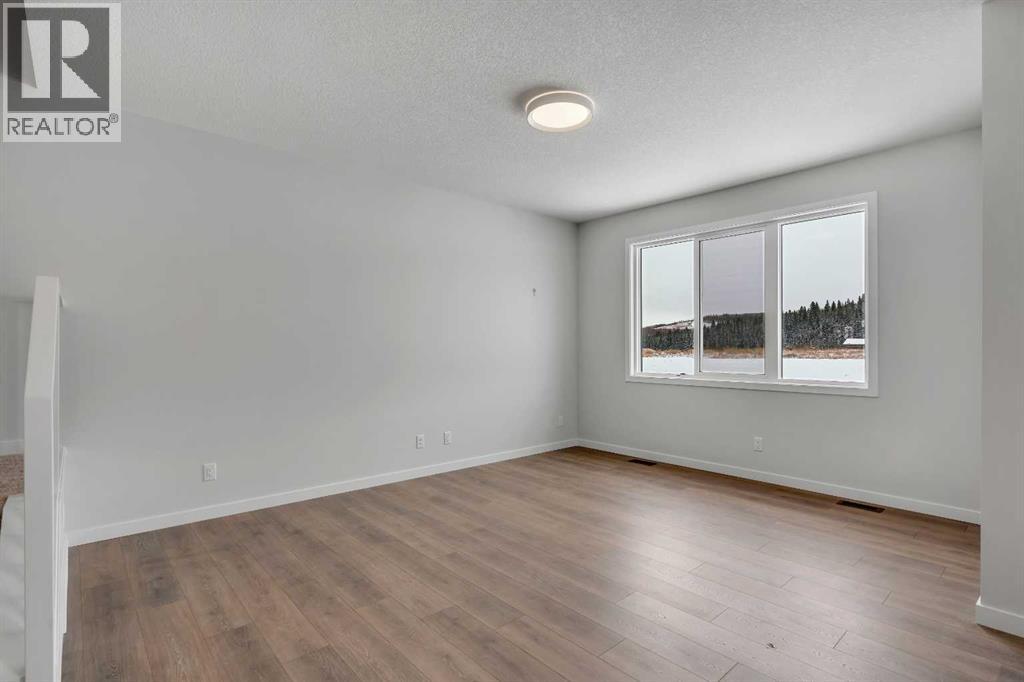 108 Creekview Manor Sw, Calgary, Alberta  T2X 4Y1 - Photo 9 - A2271874