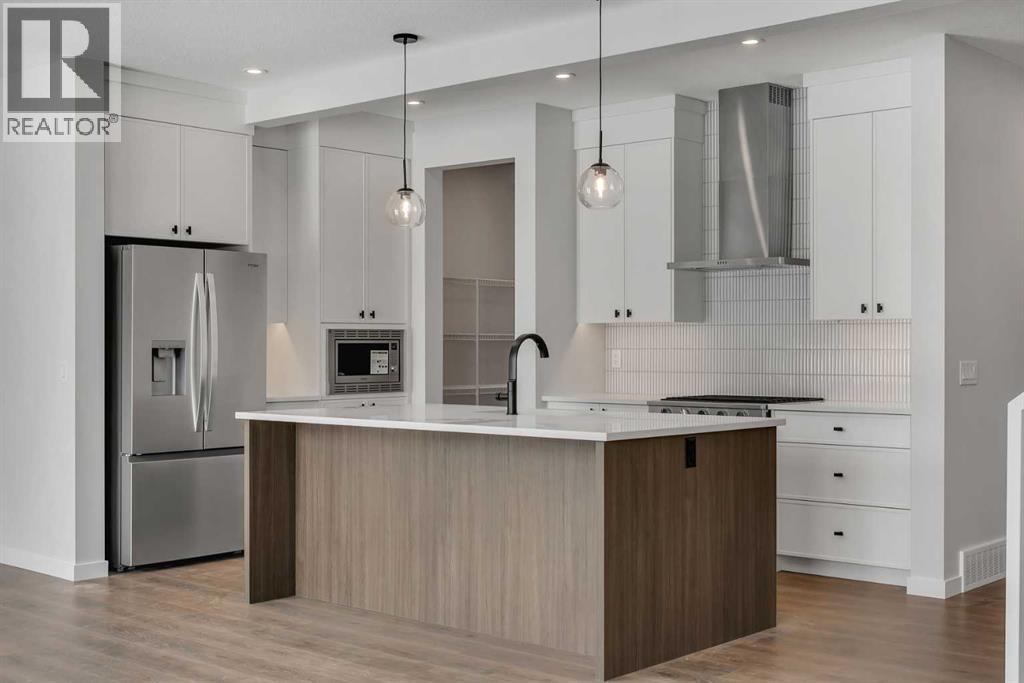 108 Creekview Manor Sw, Calgary, Alberta  T2X 4Y1 - Photo 6 - A2271874