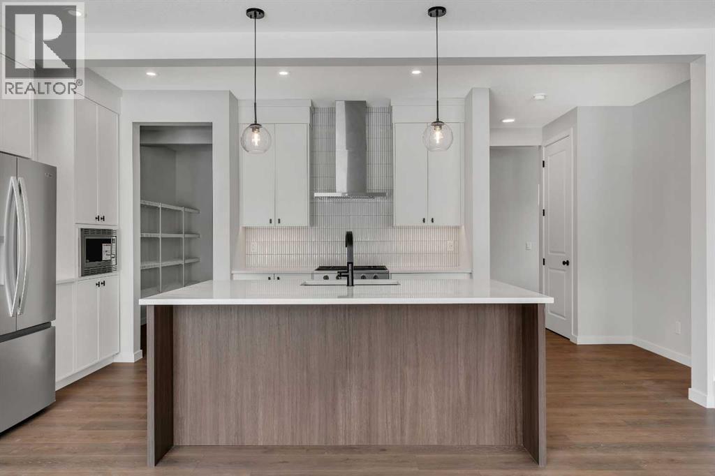 108 Creekview Manor Sw, Calgary, Alberta  T2X 4Y1 - Photo 7 - A2271874