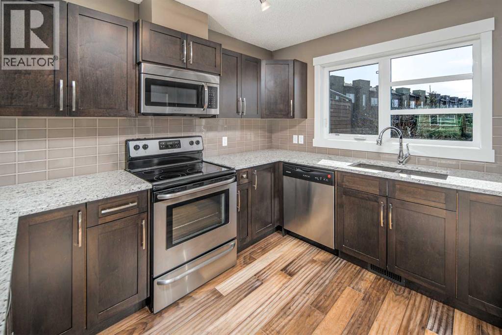 331 Covecreek Circle Ne, Calgary, Alberta  T3K 0W6 - Photo 4 - A2291508