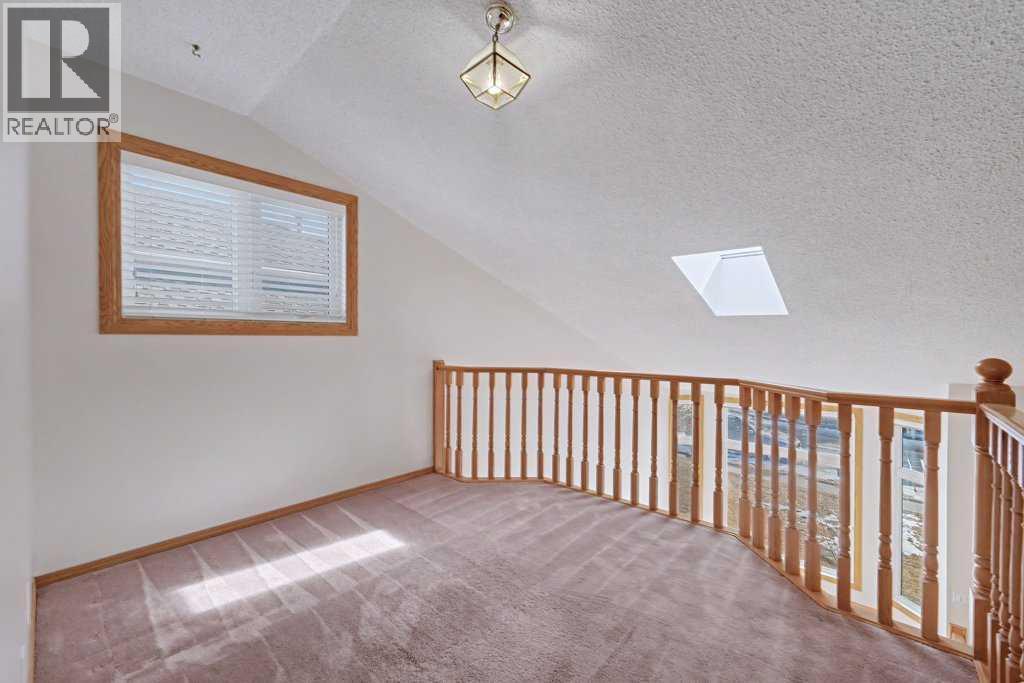 82 Wood Valley Drive Sw, Calgary, Alberta  T2W 5V6 - Photo 33 - A2290576