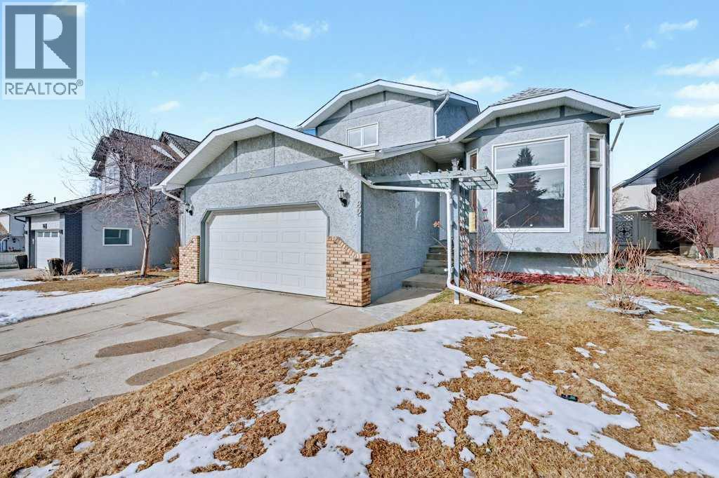 82 Wood Valley Drive Sw, Calgary, Alberta  T2W 5V6 - Photo 1 - A2290576