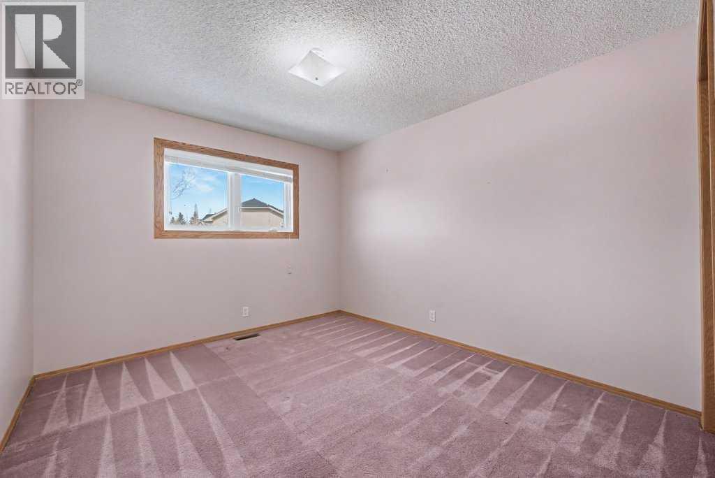 82 Wood Valley Drive Sw, Calgary, Alberta  T2W 5V6 - Photo 36 - A2290576