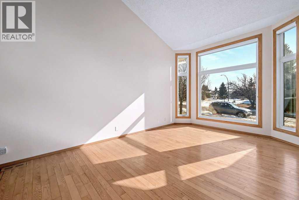 82 Wood Valley Drive Sw, Calgary, Alberta  T2W 5V6 - Photo 6 - A2290576