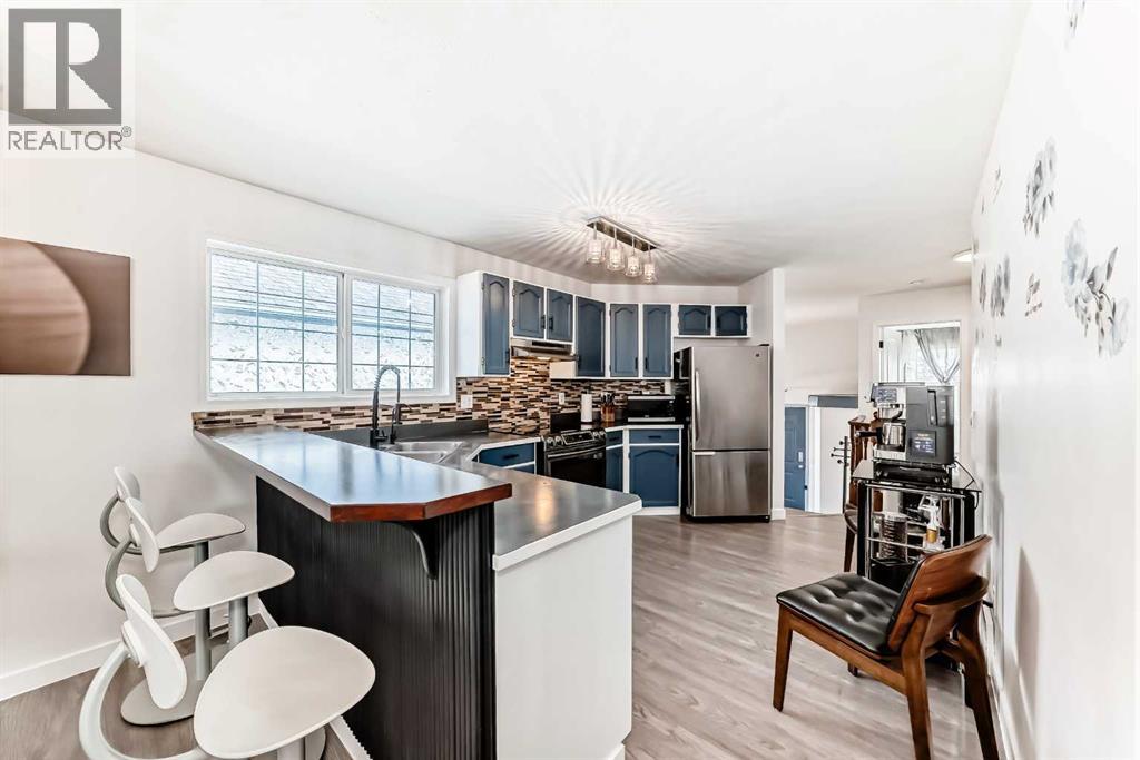 435 Coventry Road Ne, Calgary, Alberta  T2K 5N1 - Photo 11 - A2290820