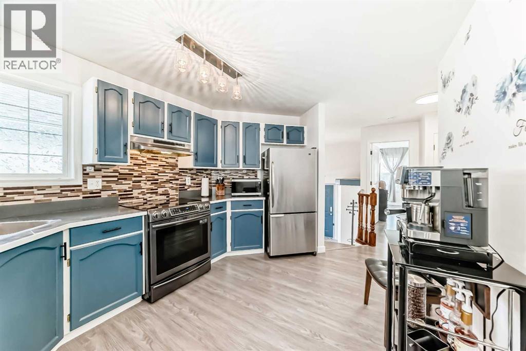 435 Coventry Road Ne, Calgary, Alberta  T2K 5N1 - Photo 9 - A2290820