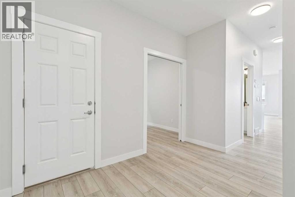 592 Creekmill Court Sw, Airdrie, Alberta  T4B 5J8 - Photo 4 - A2287833