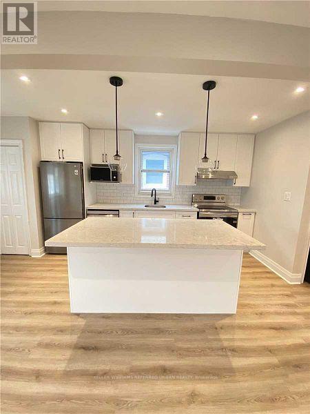 Main Flr - 27 Snider Avenue, Toronto, Ontario  M6E 4R8 - Photo 2 - W12867760