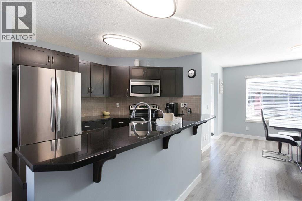 1074 Panatella Boulevard Nw, Calgary, Alberta  T3K 0L2 - Photo 7 - A2290705