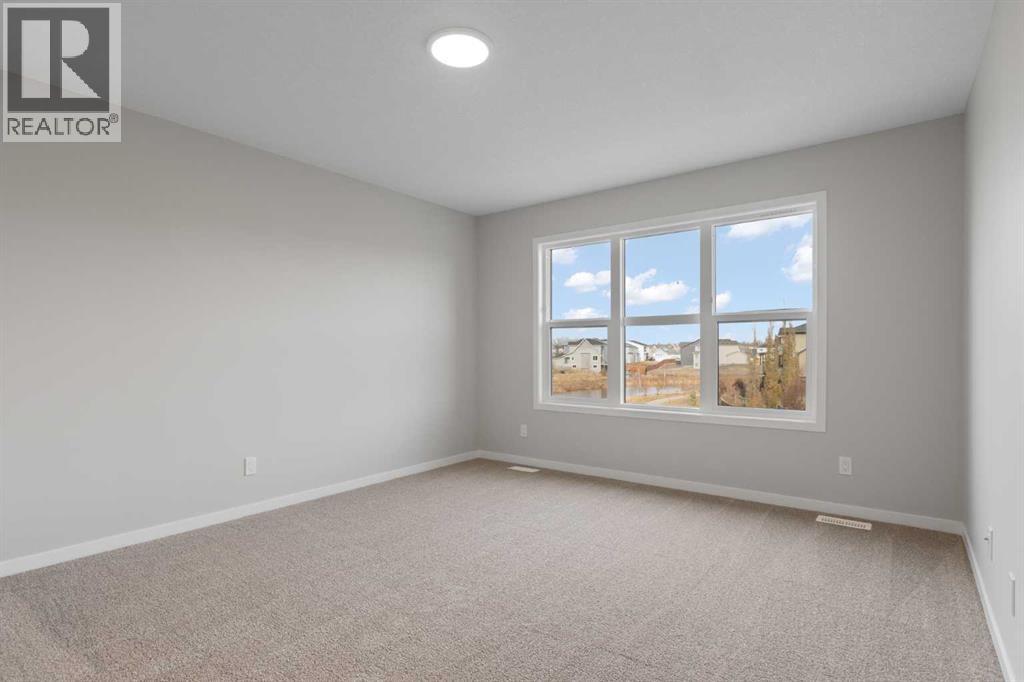 106 Monterey Bay Se, High River, Alberta  T1V 0K3 - Photo 17 - A2267748