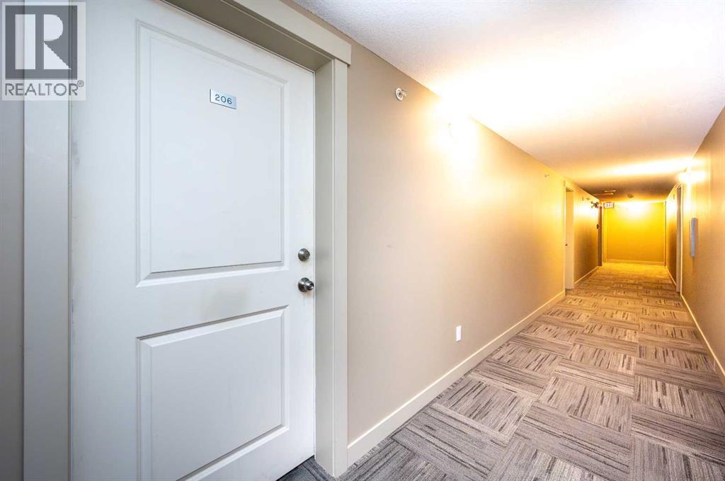 8206, 403 Mackenzie Way Sw, Airdrie, Alberta  T4B 3V7 - Photo 4 - A2289815