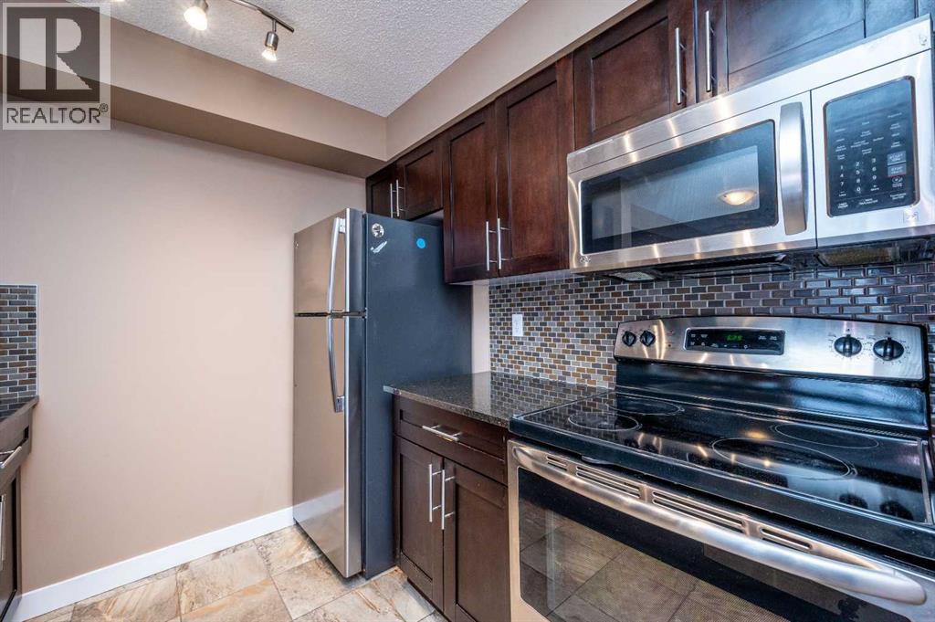 8206, 403 Mackenzie Way Sw, Airdrie, Alberta  T4B 3V7 - Photo 9 - A2289815