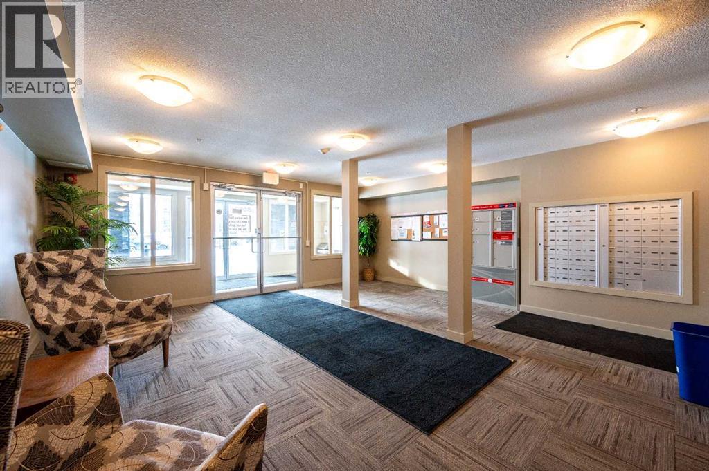 8206, 403 Mackenzie Way Sw, Airdrie, Alberta  T4B 3V7 - Photo 3 - A2289815